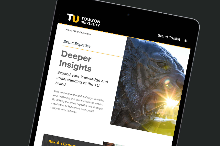 A tablet displaying the new TU website